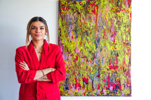Load image into Gallery viewer, Female artist Alessia Camoirano Bruges standing next to her abstract piece using chromology to evoke emotions and feelings