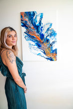 Load image into Gallery viewer, female artist Alessia Camoirano Bruges standing next to her fluid abstract painting Forgiveness